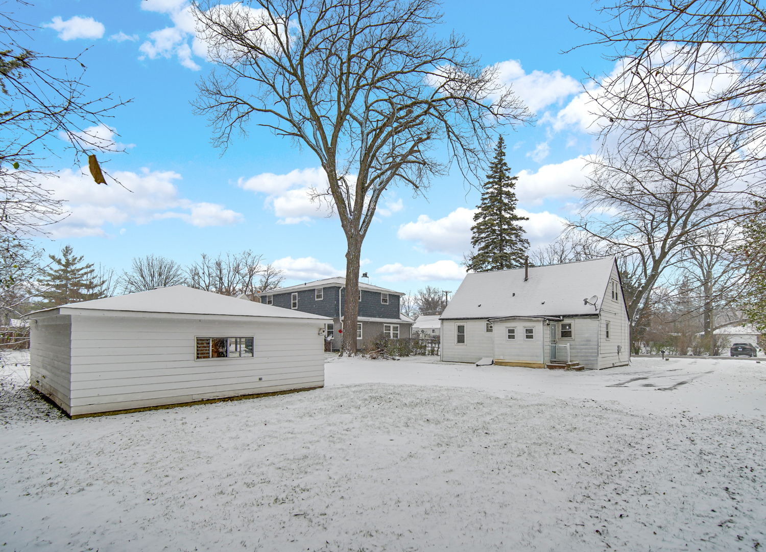 3009 Olive Road Homewood, IL 60430 - Photo 20 of 22 a view of a house with a snow in the yard