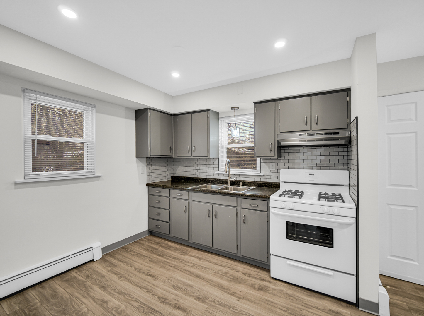 3009 Olive Road Homewood, IL 60430 - Photo 3 of 22 a kitchen with stainless steel appliances granite countertop a stove and a refrigerator