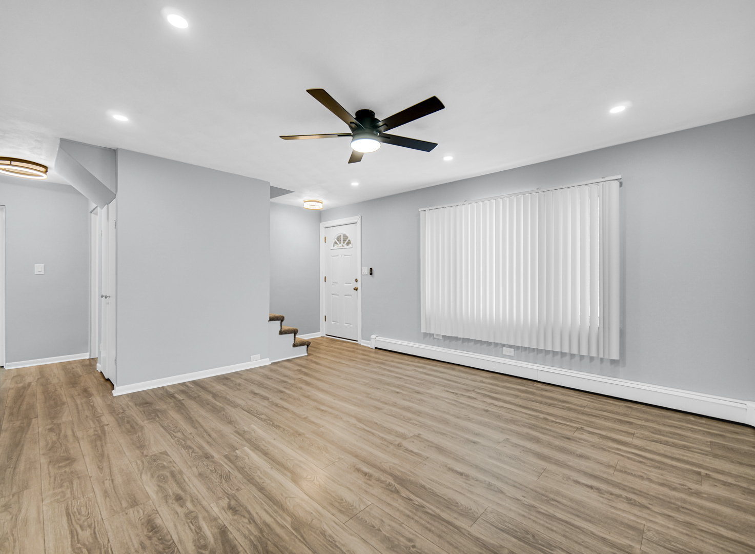 3009 Olive Road Homewood, IL 60430 - Photo 7 of 22 a view of an empty room with wooden floor