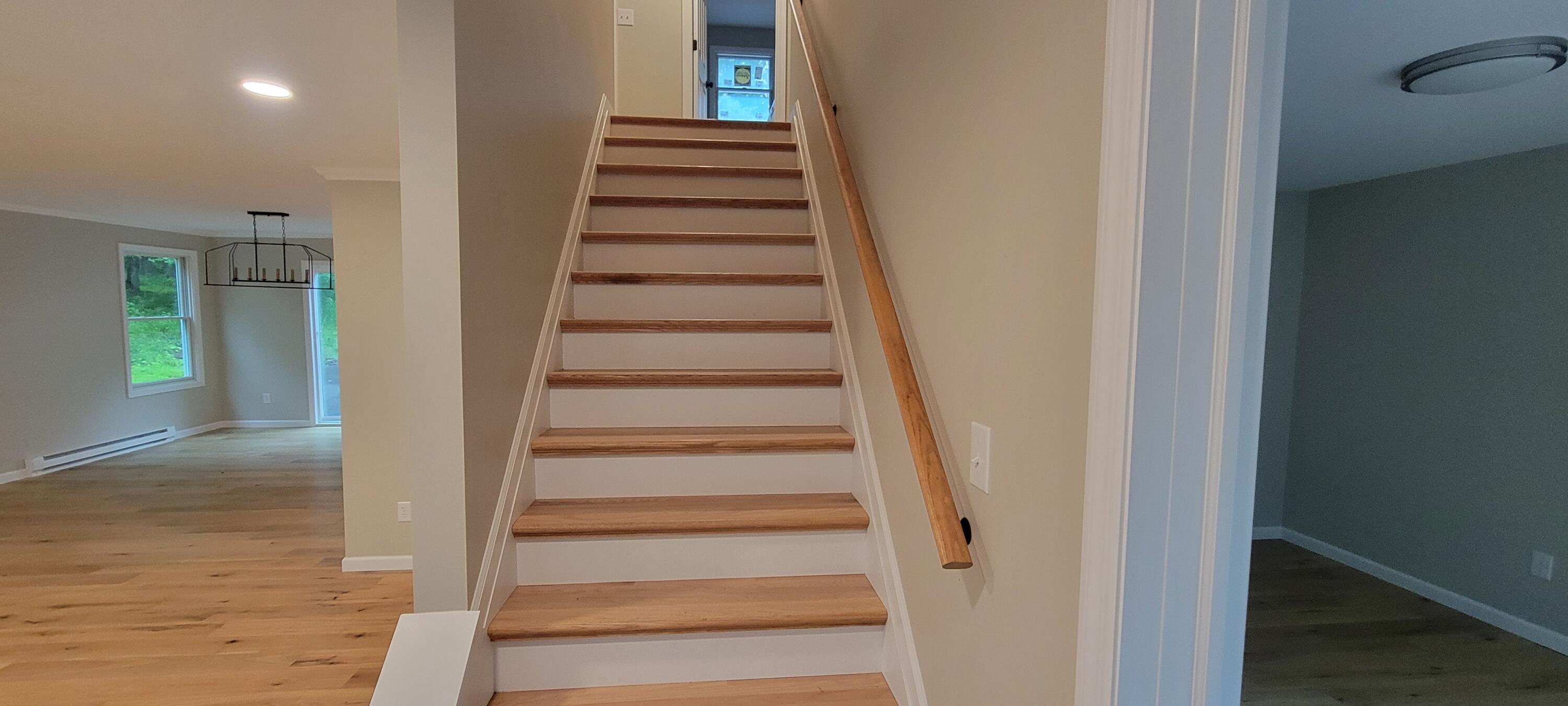 1183 Falls Road Bushkill, PA 18324 - Photo 17 of 47 Hardwood Stairs to Second Level