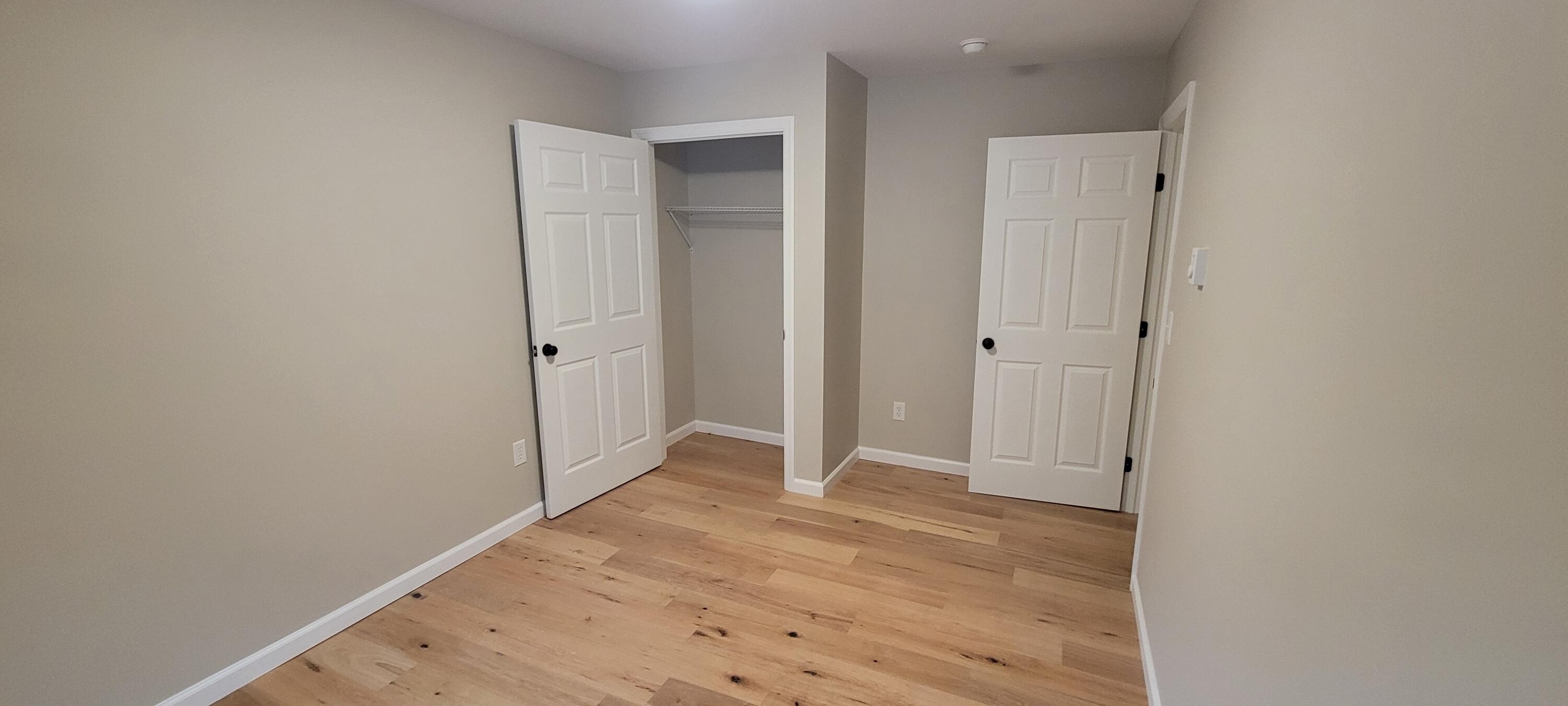 1183 Falls Road Bushkill, PA 18324 - Photo 20 of 47 Bedroom #3 Closet & Hardwood Floors