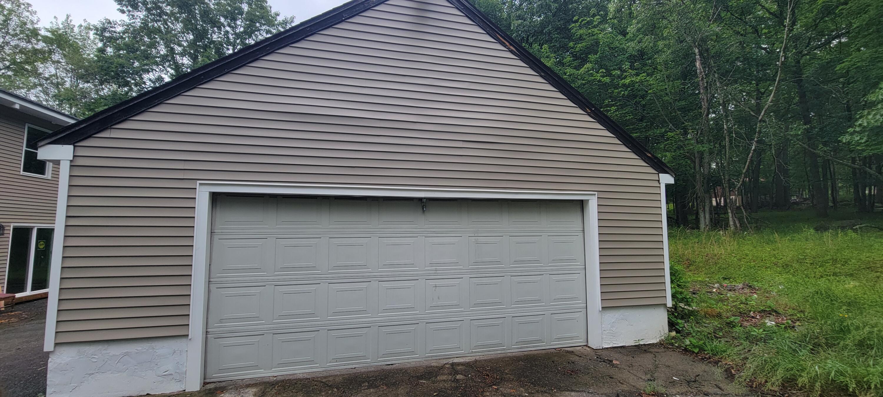 1183 Falls Road Bushkill, PA 18324 - Photo 39 of 47 Garage has Stairs to Loft