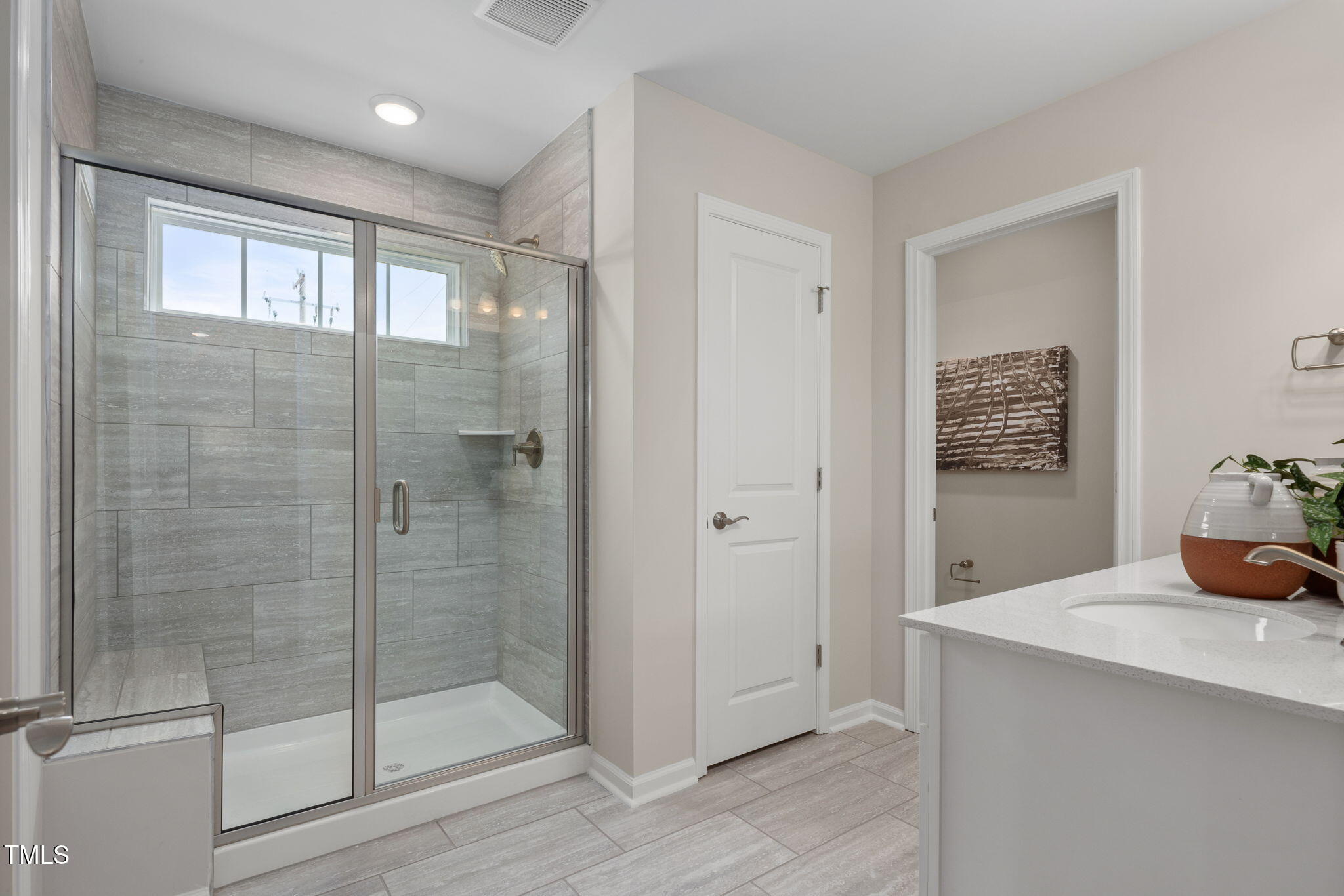 700 Ben Ledi Court Raleigh, NC 27603 - Photo 11 of 30 a bathroom with a shower