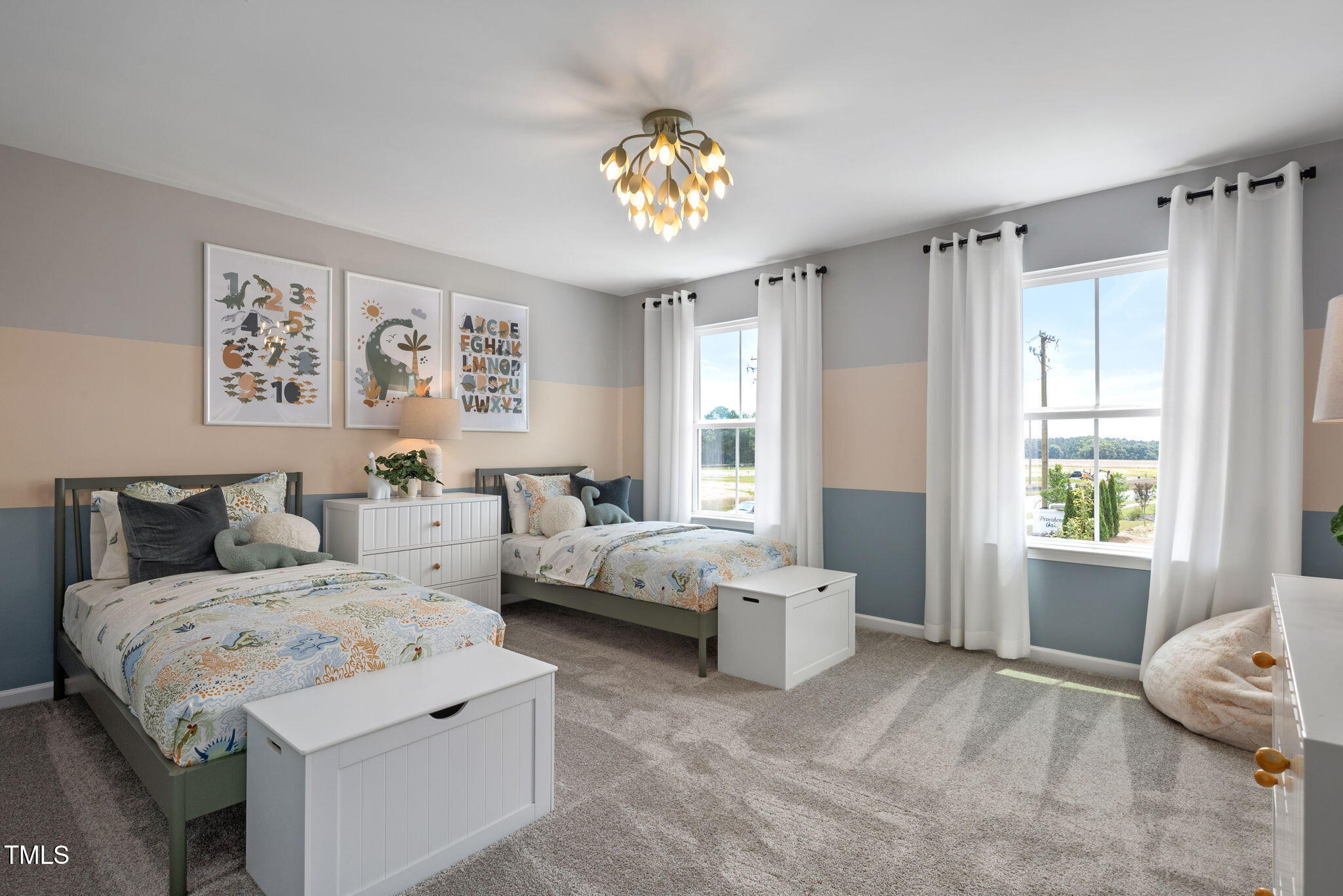 700 Ben Ledi Court Raleigh, NC 27603 - Photo 14 of 30 a spacious bedroom with a bed a chandelier and a window