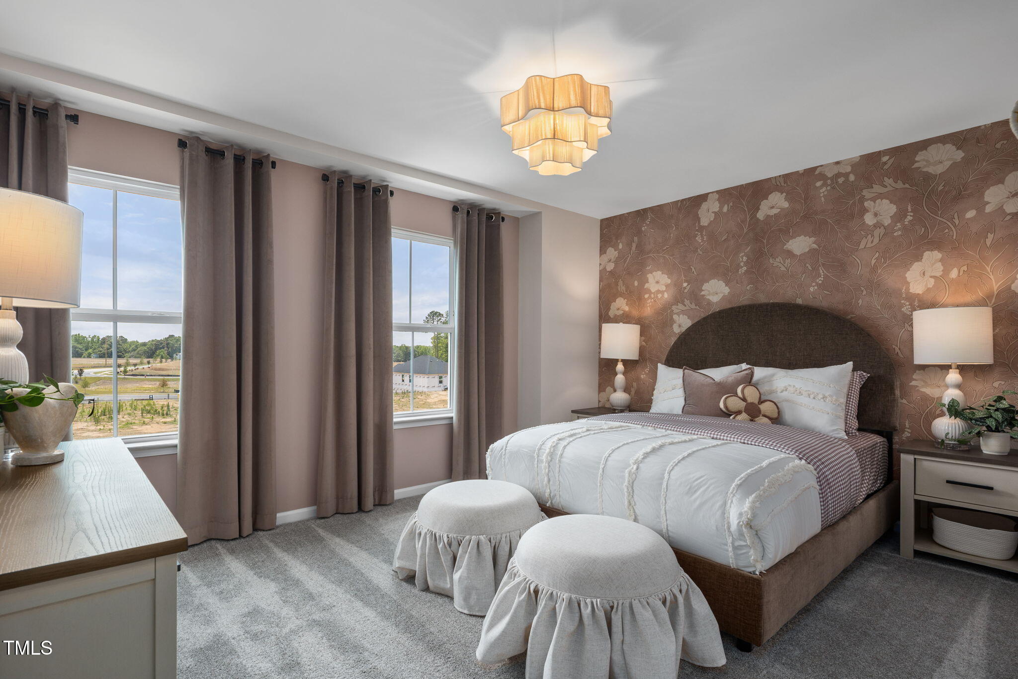 700 Ben Ledi Court Raleigh, NC 27603 - Photo 15 of 30 a bedroom with a bed and a large window