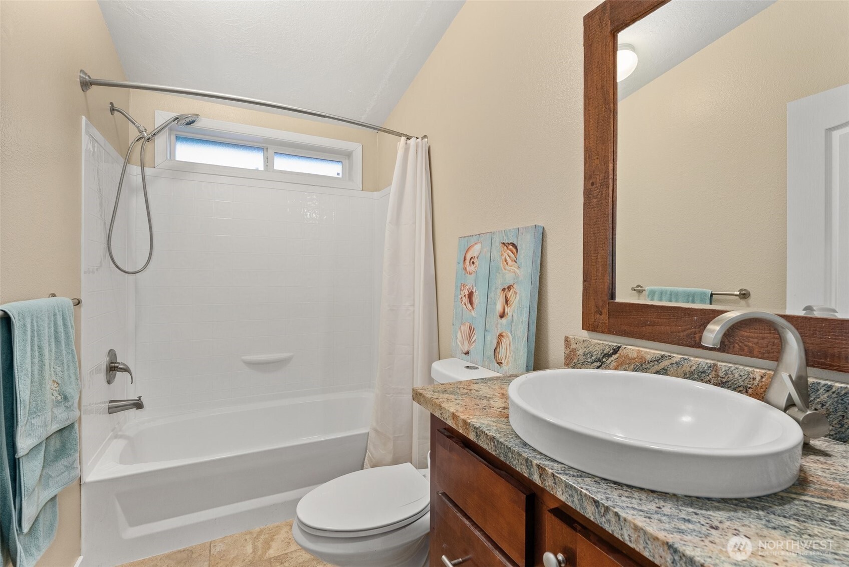 126 Burchett Road Onalaska, WA 98570 - Photo 19 of 36 a bathroom with a granite countertop sink toilet a mirror and shower