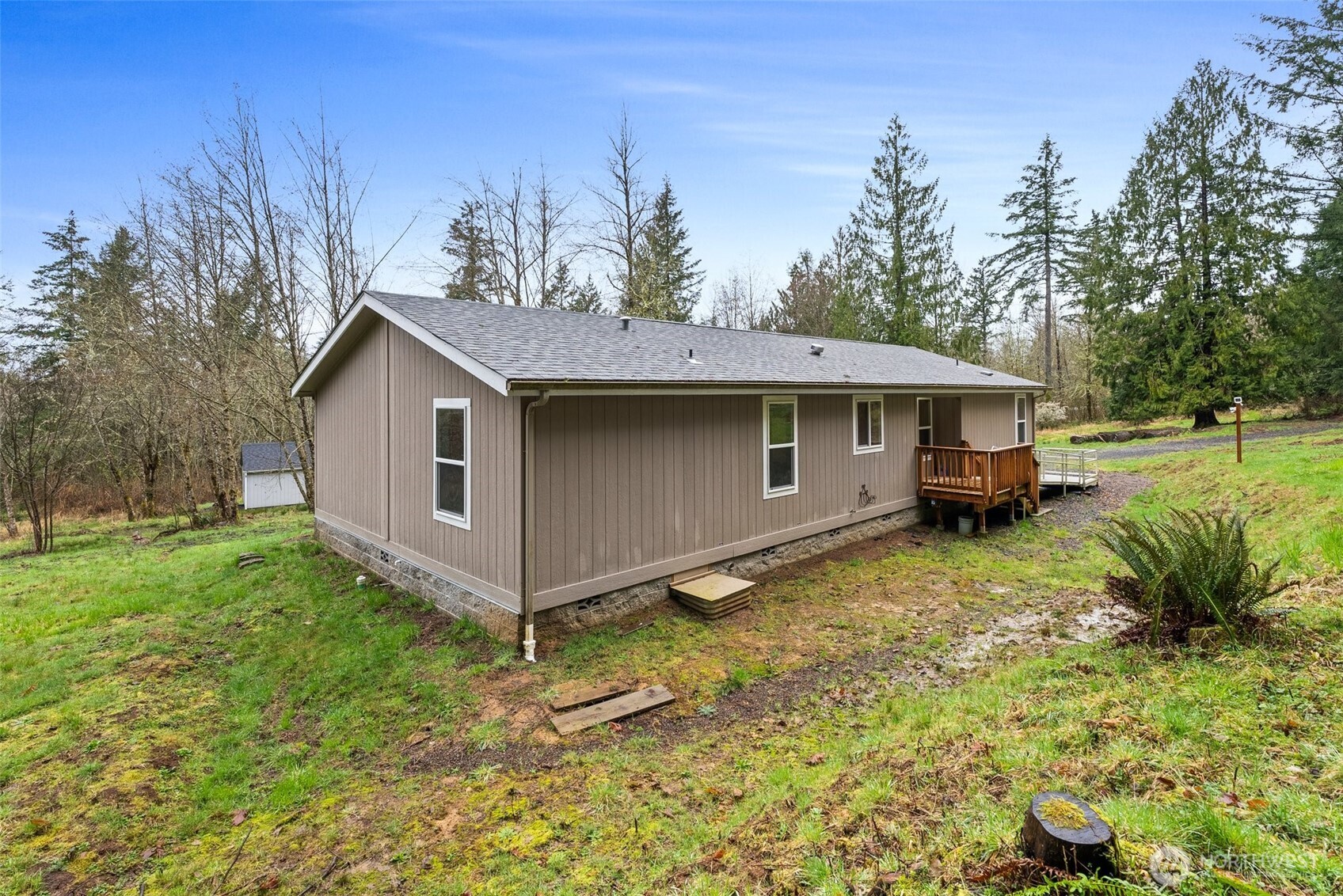 126 Burchett Road Onalaska, WA 98570 - Photo 21 of 36 a view of a house with a yard