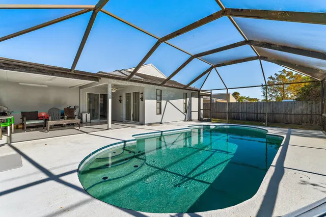 a view of a house with swimming pool