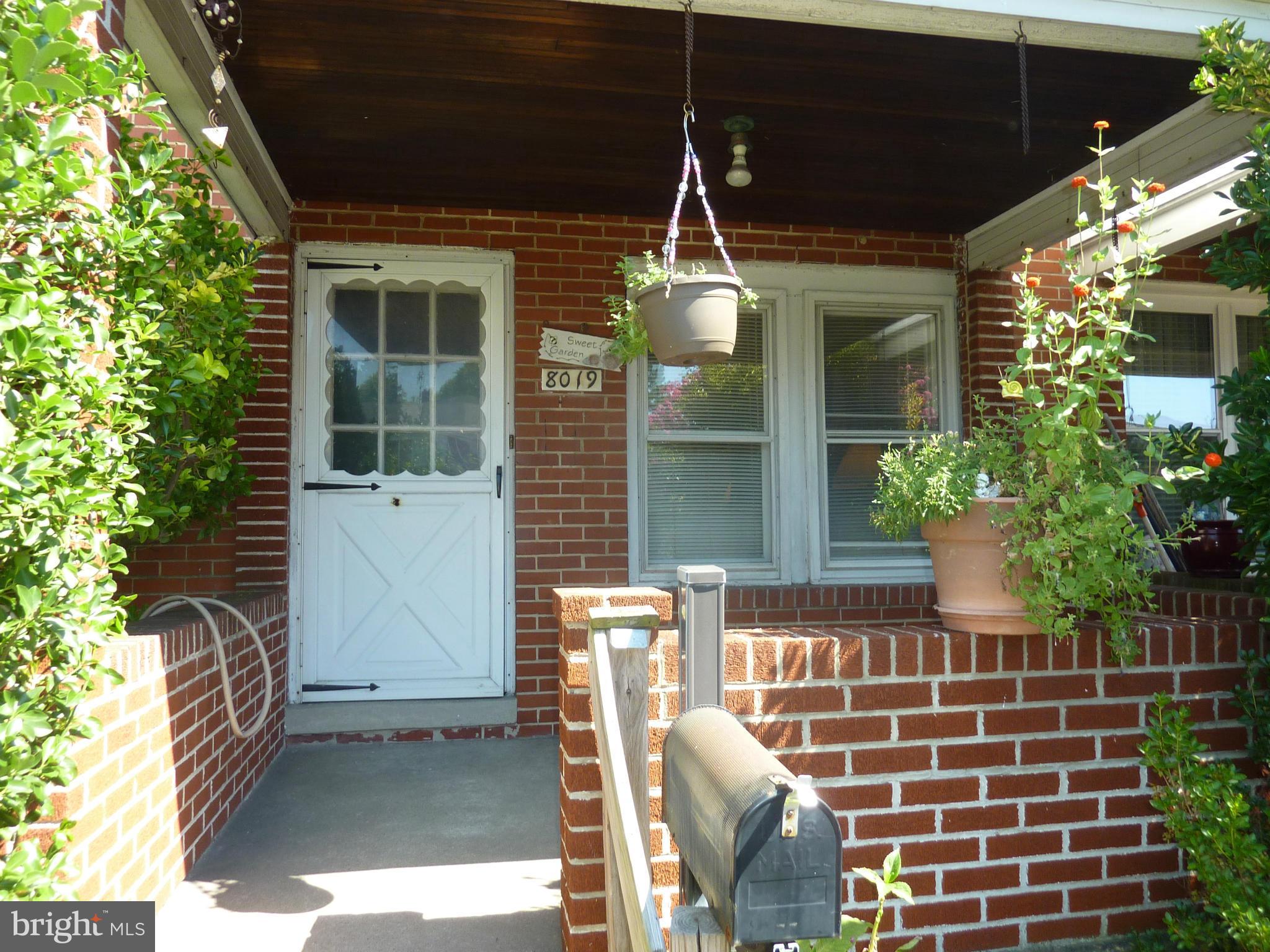 8019 Charlesmont Road Baltimore, MD 21222 - Photo 2 of 25 a front view of a house