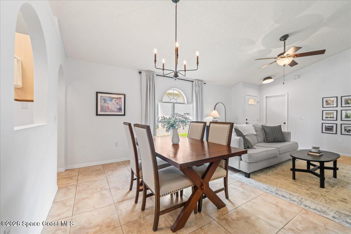 2237 Redwood Circle Palm Bay, FL 32905 - Photo 6 of 35 a view of a dining room with furniture