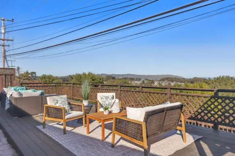 a living room with a couch and a table