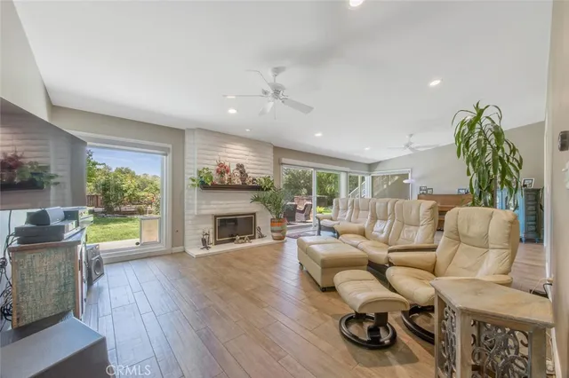 a bathroom with a double vanity sink toilet and shower