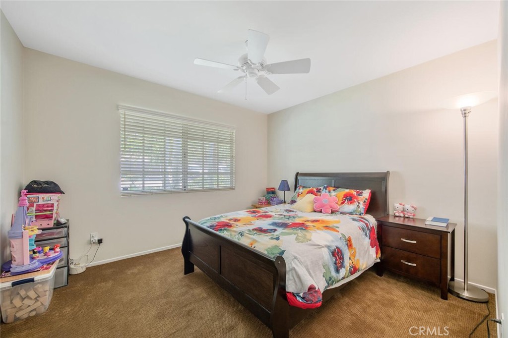 15744 Beaver Run Road Canyon Country, CA 91387 - Photo 17 of 55 a bedroom with a bed and a window