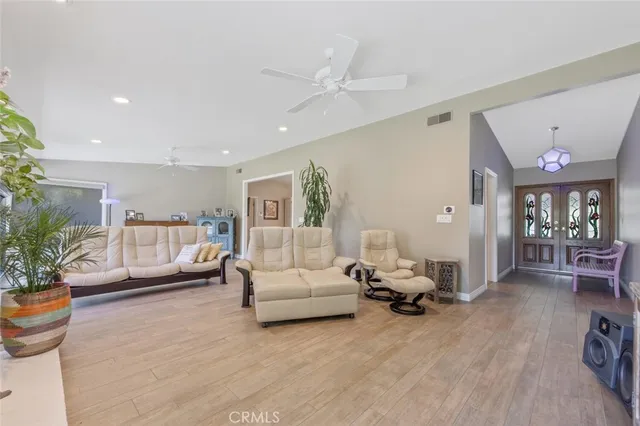 a large kitchen with cabinets and stainless steel appliances