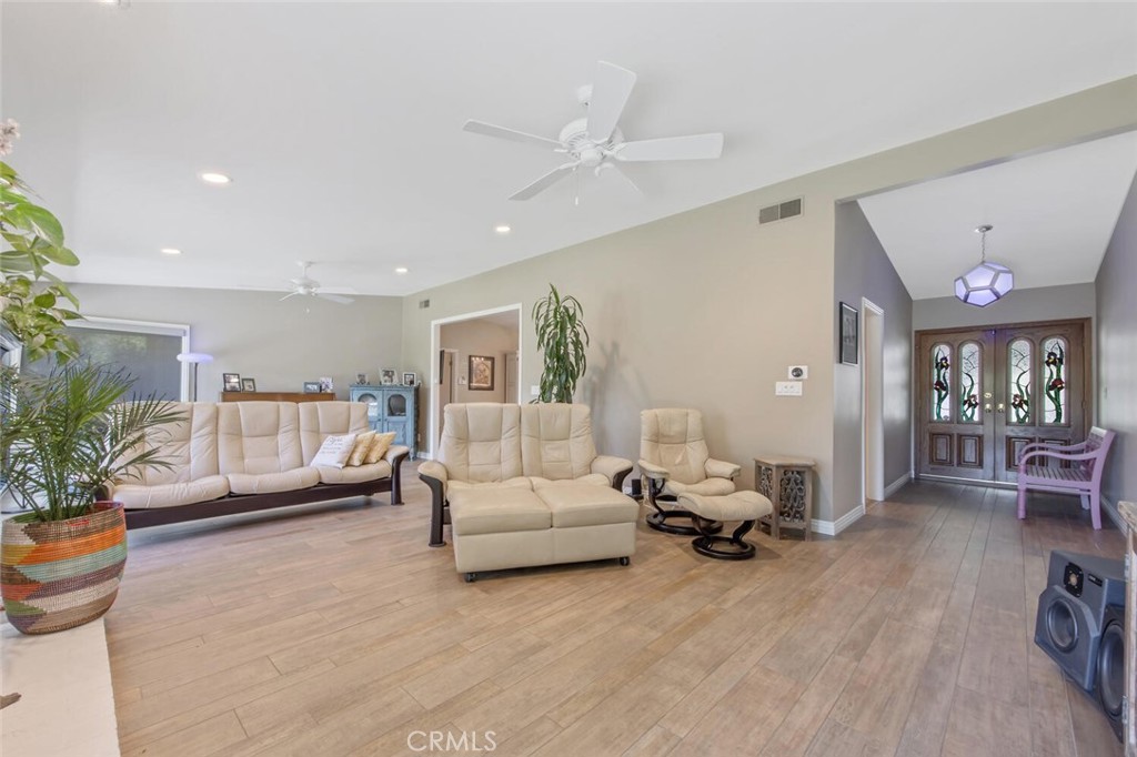 15744 Beaver Run Road Canyon Country, CA 91387 - Photo 9 of 55 a living room with furniture and a flat screen tv