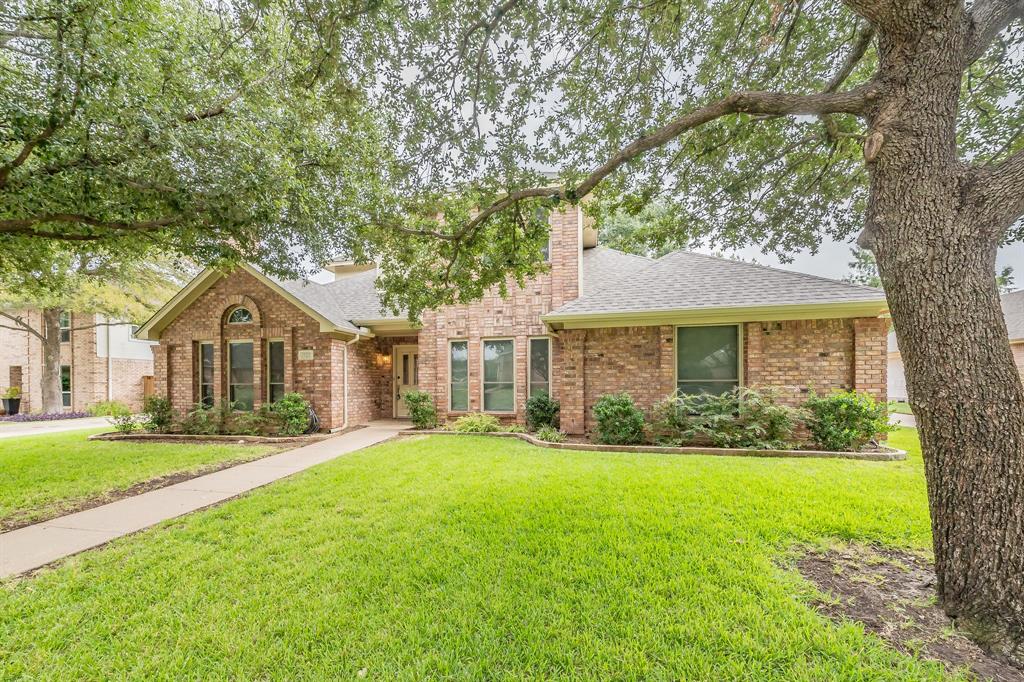1101 Pheasant Ridge Keller, TX 76248 - Photo 1 of 1 a front view of a house with a yard and garage