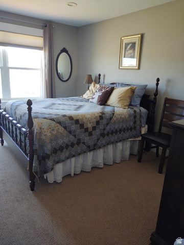 2170 Highway 357 Beaver, UT 84713 - Photo 33 of 56 Wall-to-wall carpeting, recessed ceiling lighting, and a large window with roller shade
