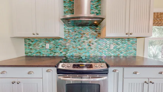 a kitchen with a sink and wooden cabinets