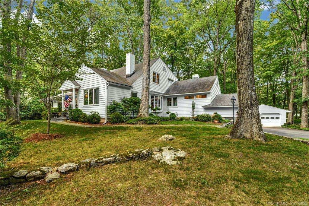 537 Rock Rimmon Road Stamford, CT 06903 - Photo 1 of 1 a front view of a house with a yard