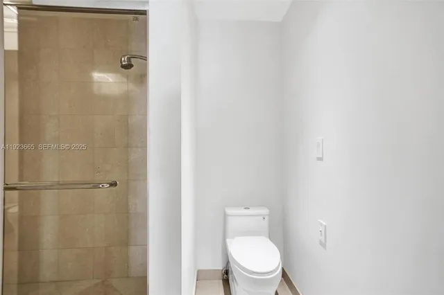 a view of an empty walk in closet