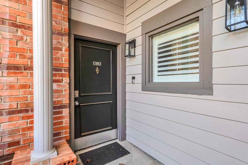 2524 Preston Road, Unit 1205 Plano, TX 75093 - Photo 3 of 25 Front door to condo just to the left of #1206