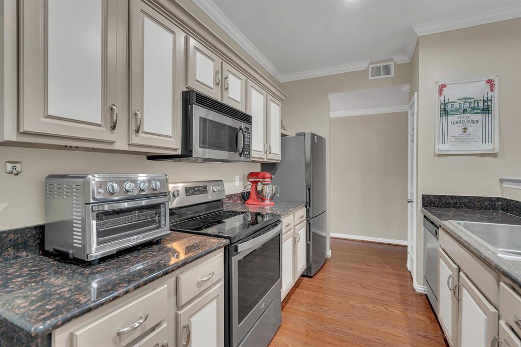 2524 Preston Road, Unit 1205 Plano, TX 75093 - Photo 8 of 25 Kitchen view from other end towards the entrance