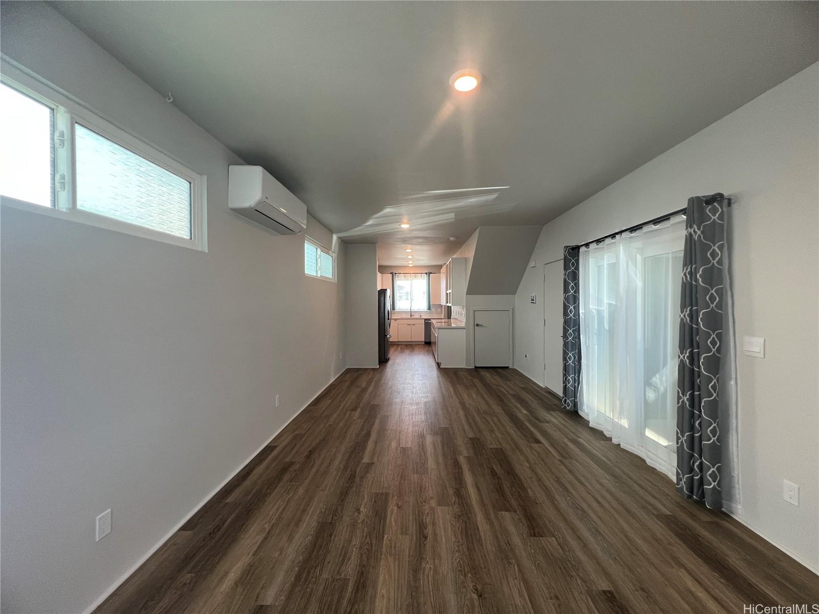 91-1640 Honouliuli Street, Unit 66 Ewa Beach, HI 96706 - Photo 4 of 20 a view of gallery with wooden floor