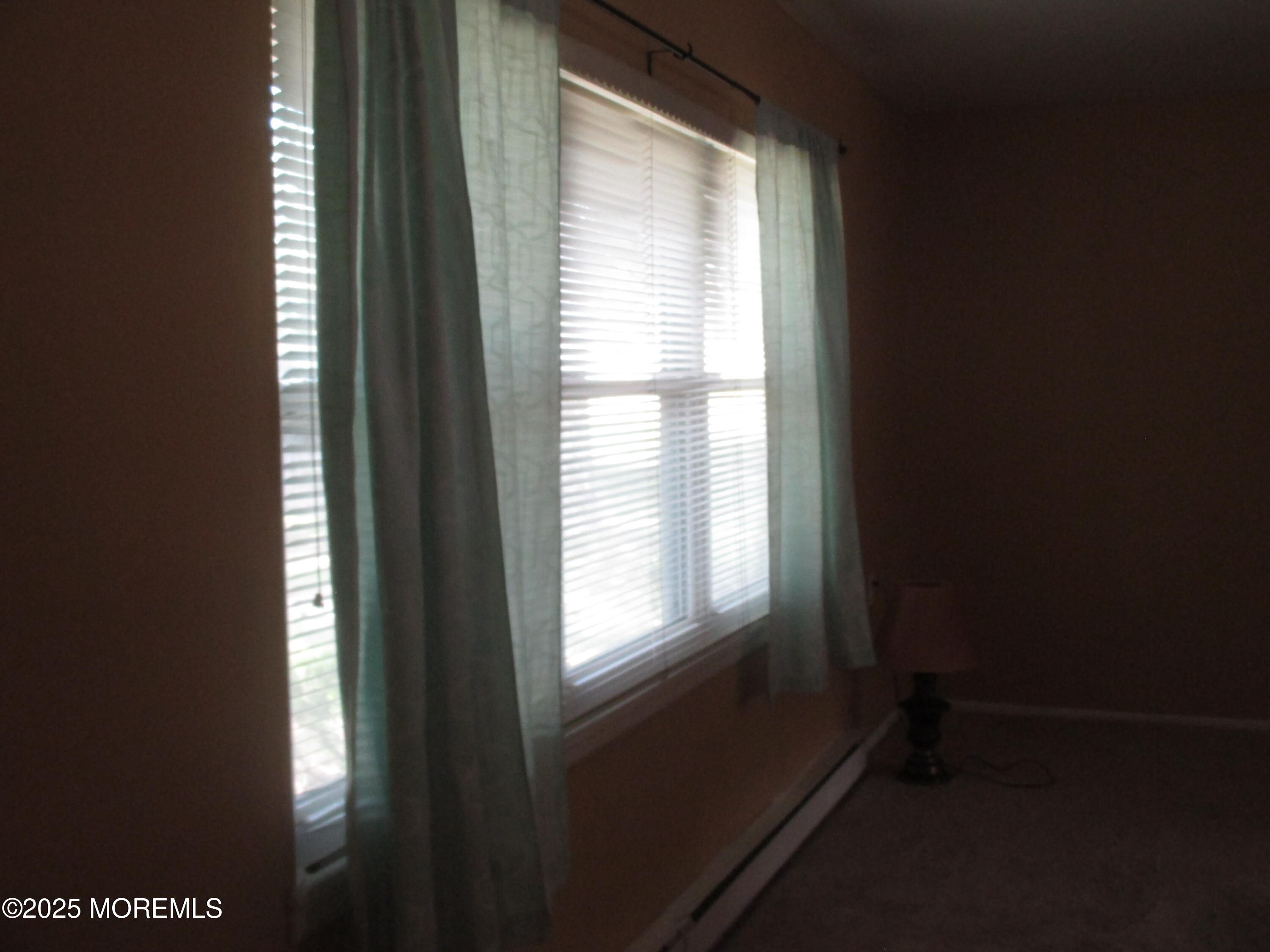662 A Plymouth Drive Lakewood, NJ 08701 - Photo 9 of 21 a view of an empty room with a window