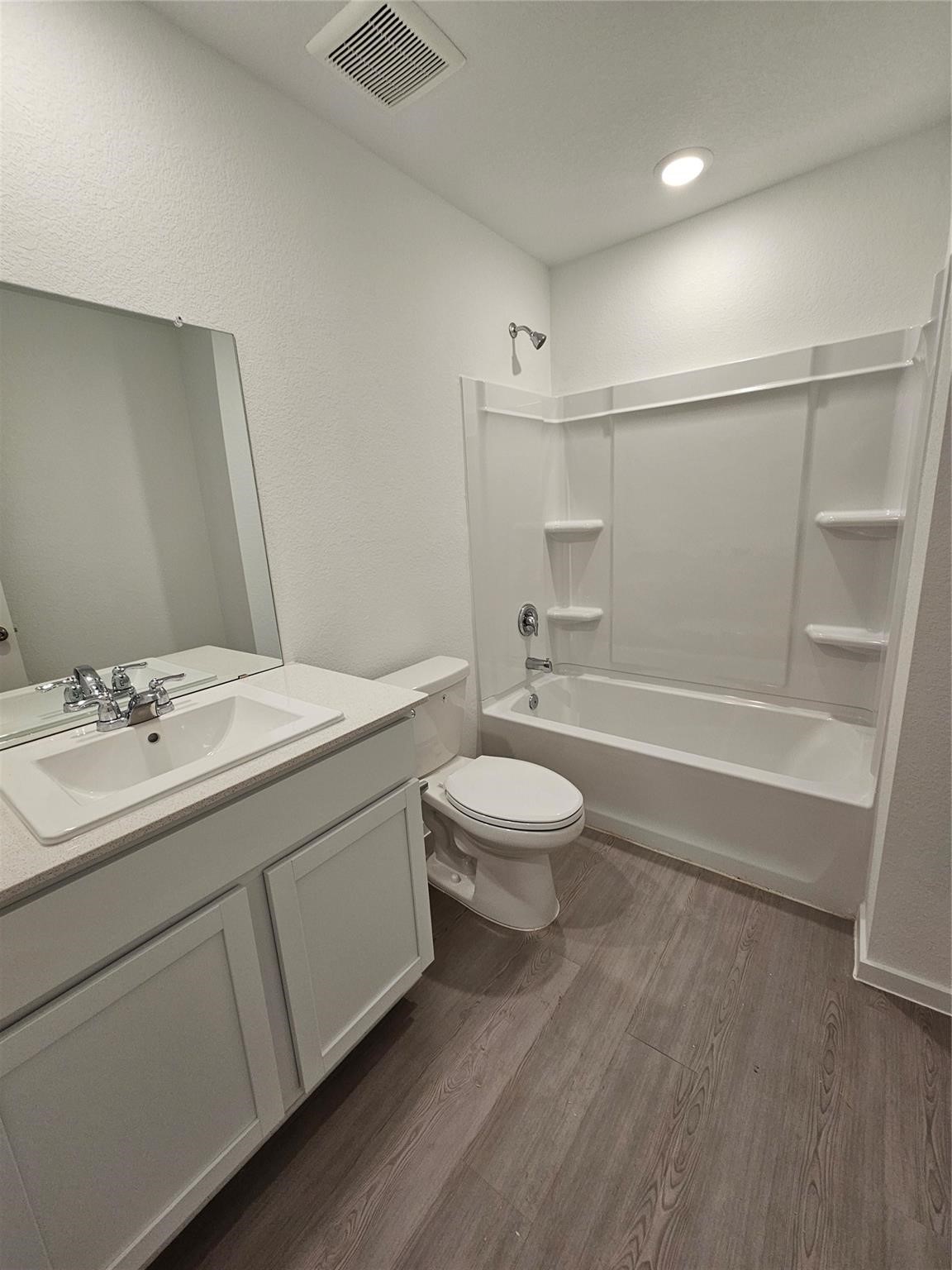 17318 Roxboro Ridge Lane Crosby, TX 77532 - Photo 9 of 28 a bathroom with a sink a toilet and shower