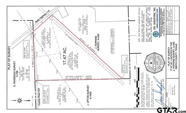 a picture of a room with a white wall and a large window