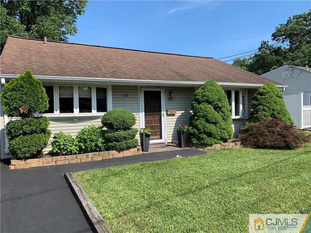 15 Sanders Road Edison, NJ 08817 - Photo 2 of 13 front view of a house with a yard