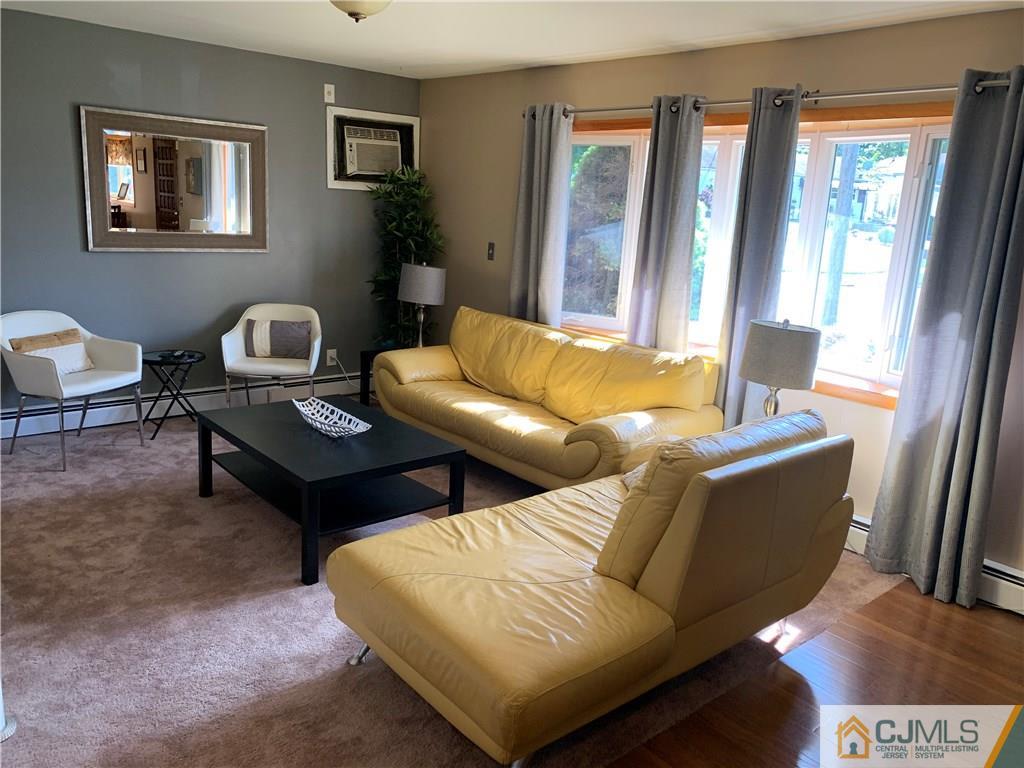 15 Sanders Road Edison, NJ 08817 - Photo 3 of 13 a living room with furniture and a window