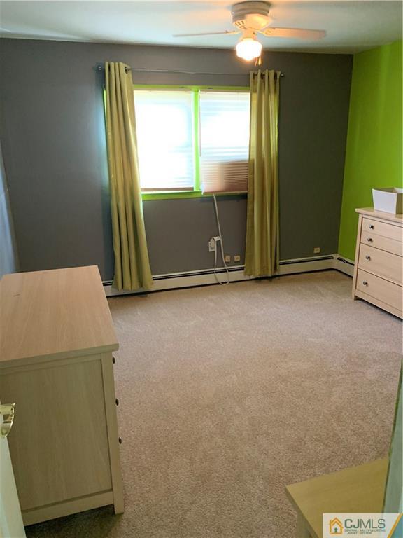 15 Sanders Road Edison, NJ 08817 - Photo 9 of 13 a view of room with window and refrigerator