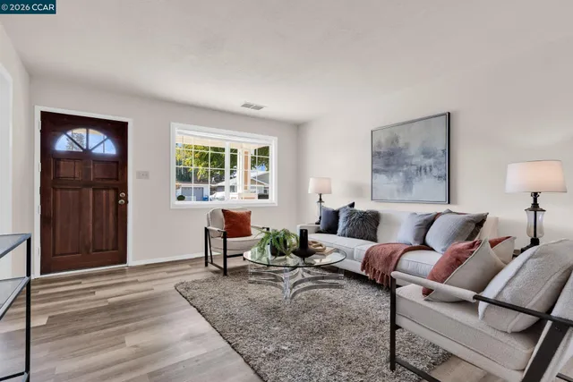a living room with furniture and view