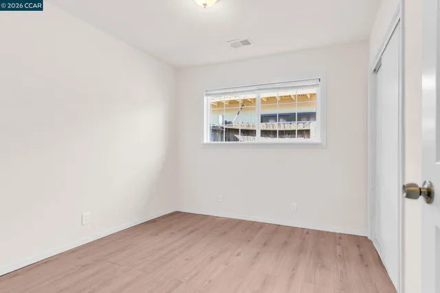a bathroom with a sink a mirror and a shower curtain