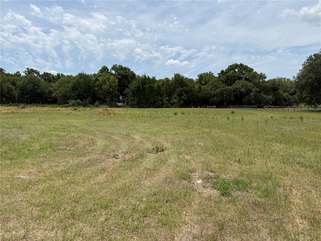 Southeast Sunset Harbor Road Weirsdale, FL 32195 - Photo 8 of 19 a view of outdoor space and yard