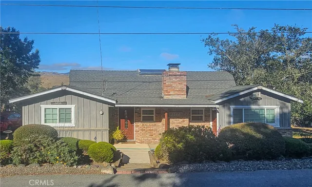 a view of a house with a garden