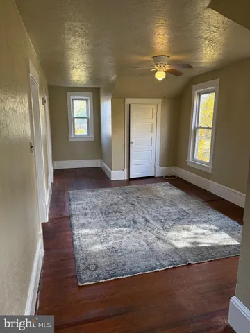 a view of livingroom with hardwood floor and window