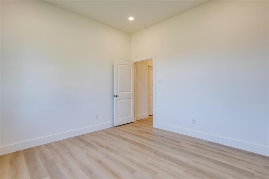 1507 Elk Creek Road Dallas, TX 75253 - Photo 22 of 40 a view of an empty room