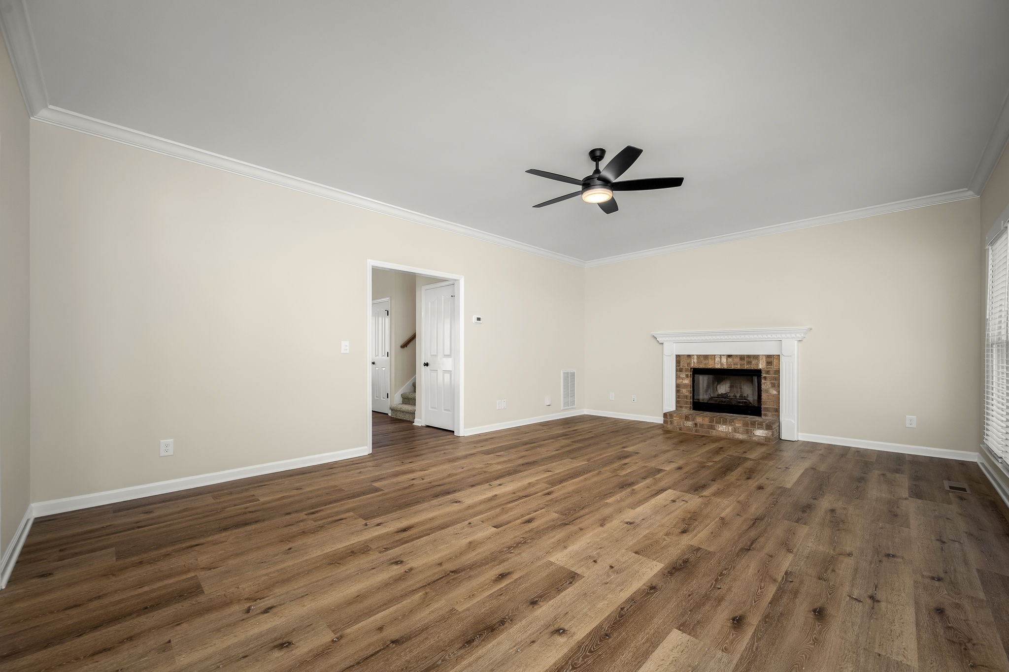 2923 Regenwood Drive Murfreesboro, TN 37129 - Photo 11 of 34 wooden floor with a ceiling fan and wooden floor in a room
