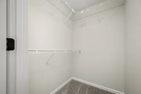 a view of a room with racks on the wall