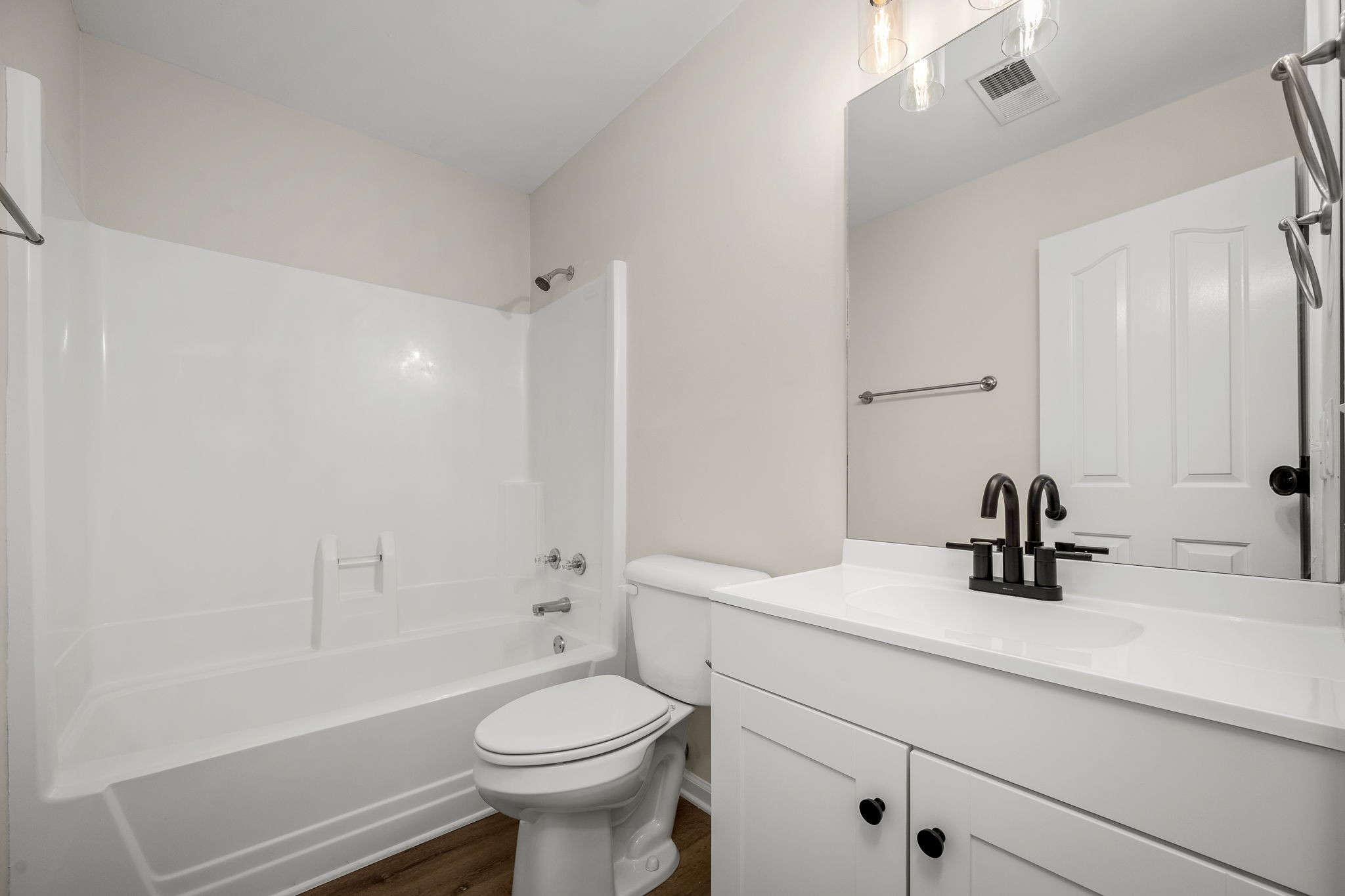 2923 Regenwood Drive Murfreesboro, TN 37129 - Photo 23 of 34 a bathroom with a sink a toilet and shower