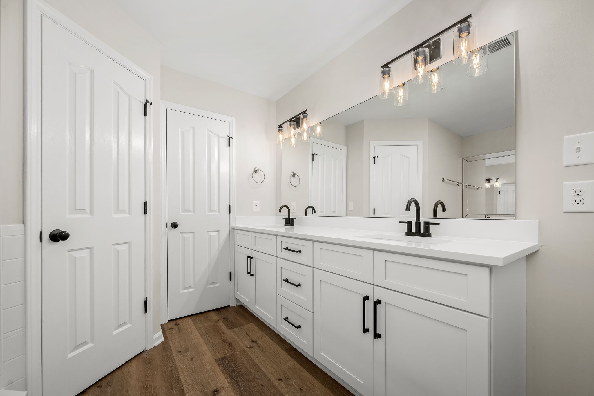 2923 Regenwood Drive Murfreesboro, TN 37129 - Photo 26 of 34 a spacious bathroom with a double vanity sink a mirror and shower