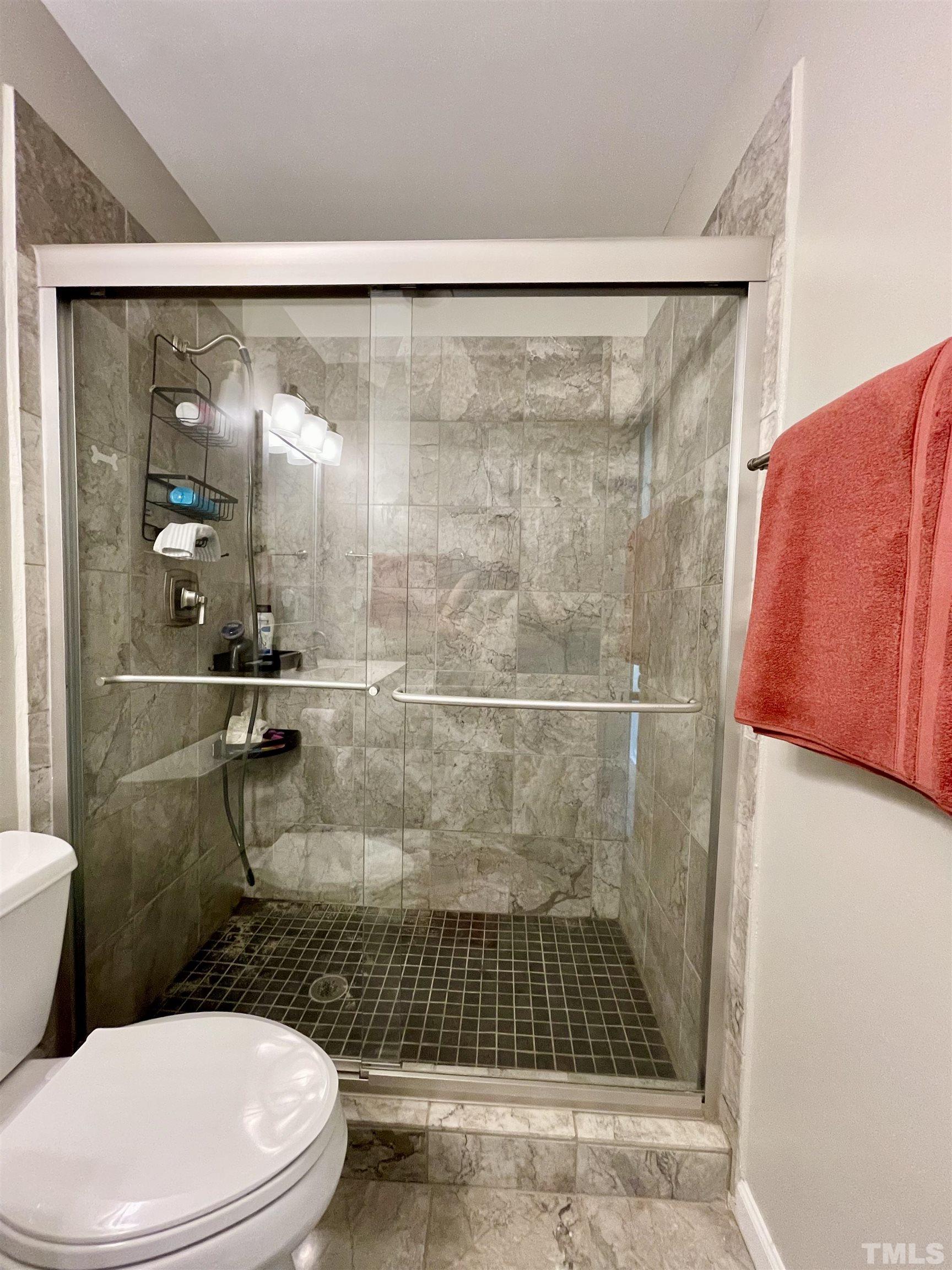 1201 Red Brick Road Garner, NC 27529 - Photo 69 of 71 a bathroom with a toilet and a shower