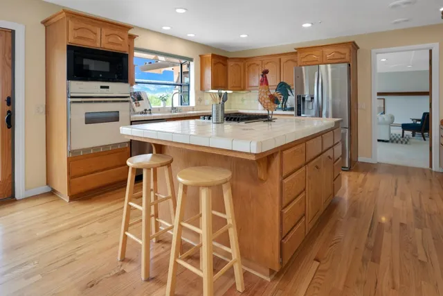 a dining room with furniture and a fireplace