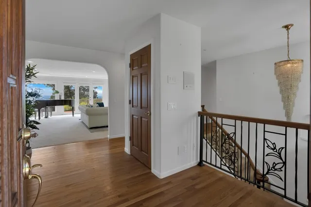 a view of a kitchen with a sink and a window
