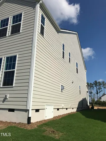 a view of a back yard of the house