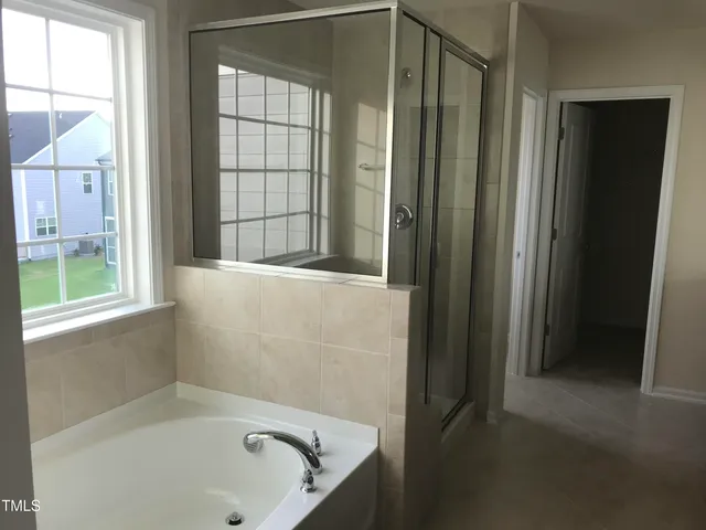 a bathroom with a bathtub