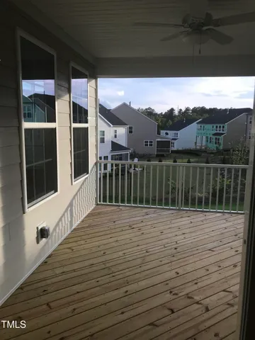 a view of balcony with furniture