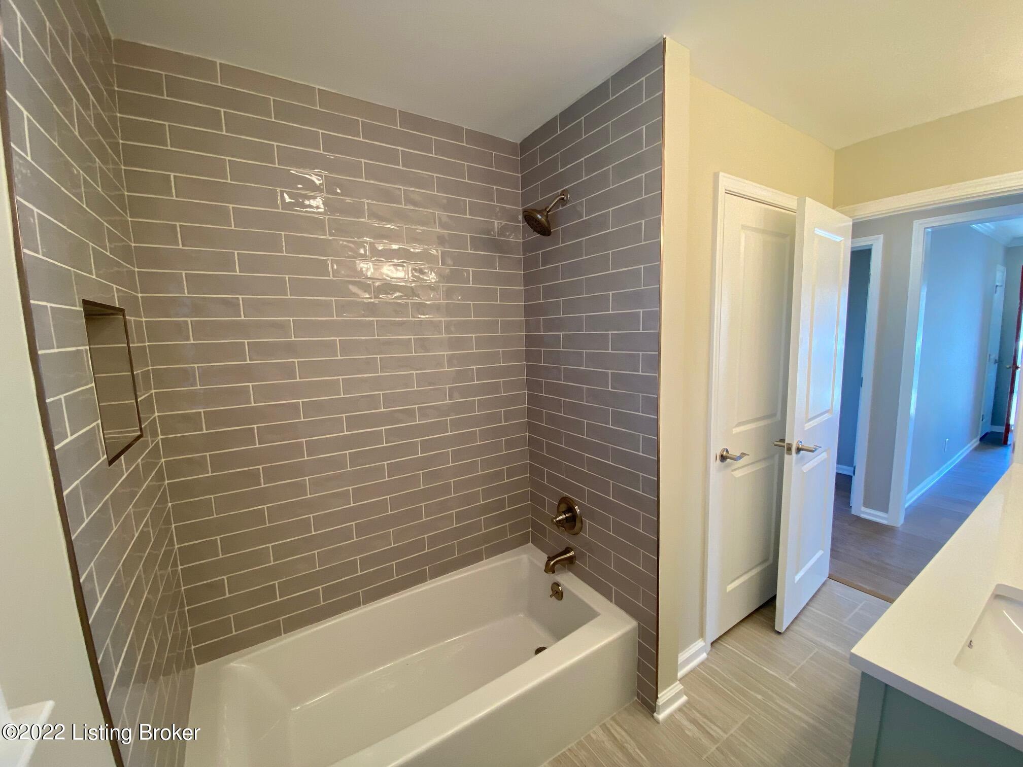 2885 Lake Jericho Road Smithfield, KY 40068 - Photo 21 of 48 Guest Bath w/ Double Vanity, Ceramic Tile, and Large Double Linen Closet